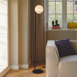 Nordlux Wilson floor lamp, metal, black, glass globe shade