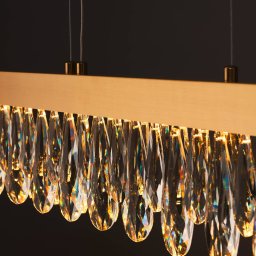 Brilliant LED hanging light Celestia, length 110 cm brass-coloured crystal