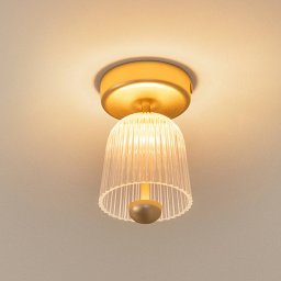 Nuura Aps Nuura LED ceiling lamp Asteea, Ø 12 cm, brass-coloured/clear