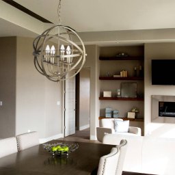 Searchlight Orbit hanging light with a cage design