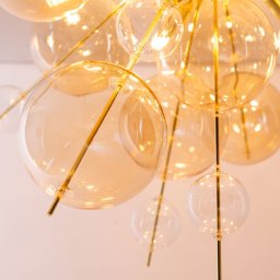 Näve Explosion bubble ceiling light with amber-coloured spheres