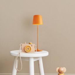 Brilliant LED table lamp Kaami, dimmable orange matt