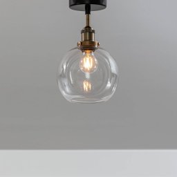 PR Home Omega ceiling light, clear/brass/black, Ø 20 cm