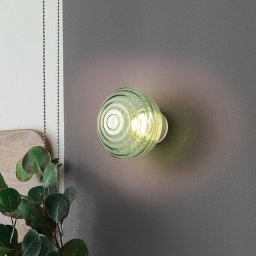 Reality Leuchten LED battery wall light Earl, brass/green, glass, Ø 15.5 cm