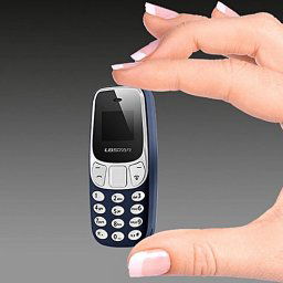 Mini Telefon Dual Sim cu Radio FM si Bluetooth