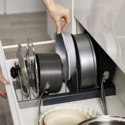 Suport adjustabil pentru capace