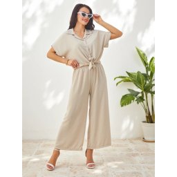 Resti Women's set with a tied short-sleeve shirt and flared pants with rhinestones