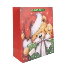 Ursuleț cu șapcă de Moș Crăciun, pungă cadou - 26 x 32 cm