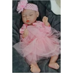 Păpușă bebeluș Reborn fetiță cu fustiță din tul roz - 43 cm