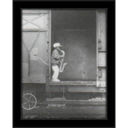 Mali saksofonista u vozu, uramljena slika 40x50cm