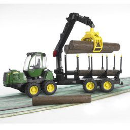 Traktor John Deer 1210E, sa drvima i prikolicom 021337