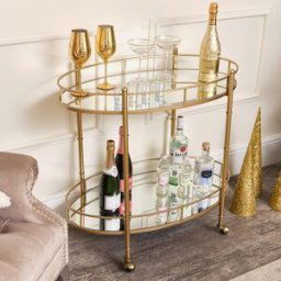 Gold Mirrored Oval Drinks Trolley Material: Home Decor & Accessories/Shelves & Storage